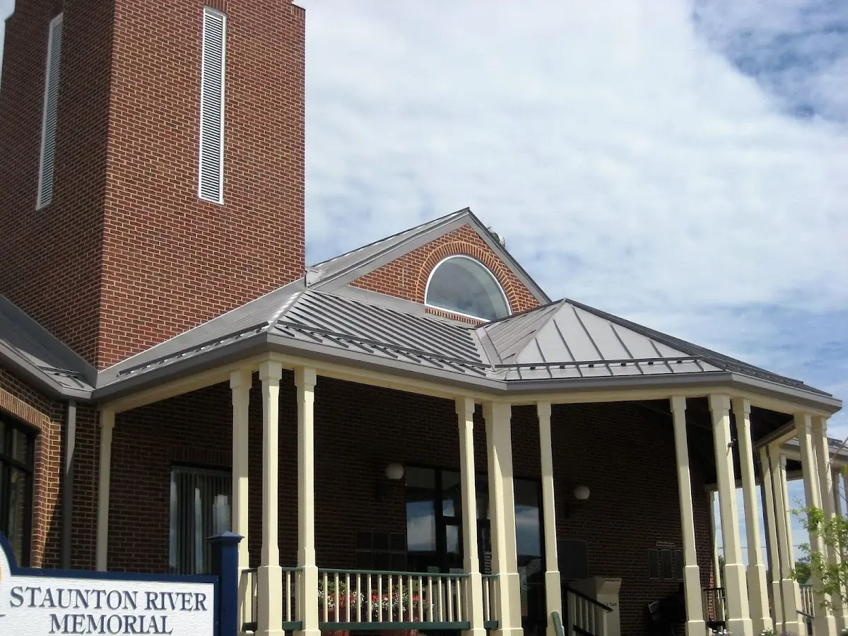 Skilled roofing craftsmen working on a residential roof in Hanover